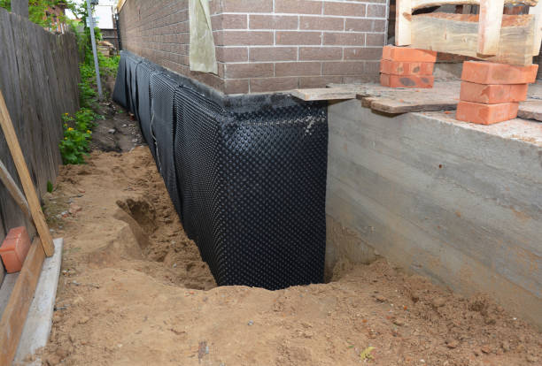 Happy homeowners after waterproofing job in North Greece